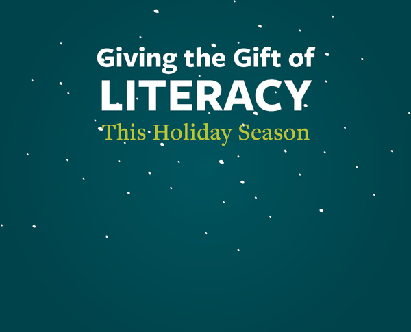 Dark green background with snowflakes and the text "Giving the gift of literacy this holiday season"